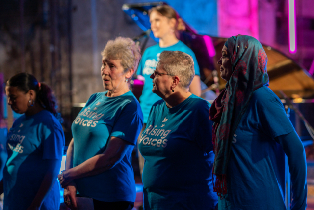 Rising Voices performing on stage at the Mount Without at Jimmy Galvin's event 'Sacred Frequencies' 2024.