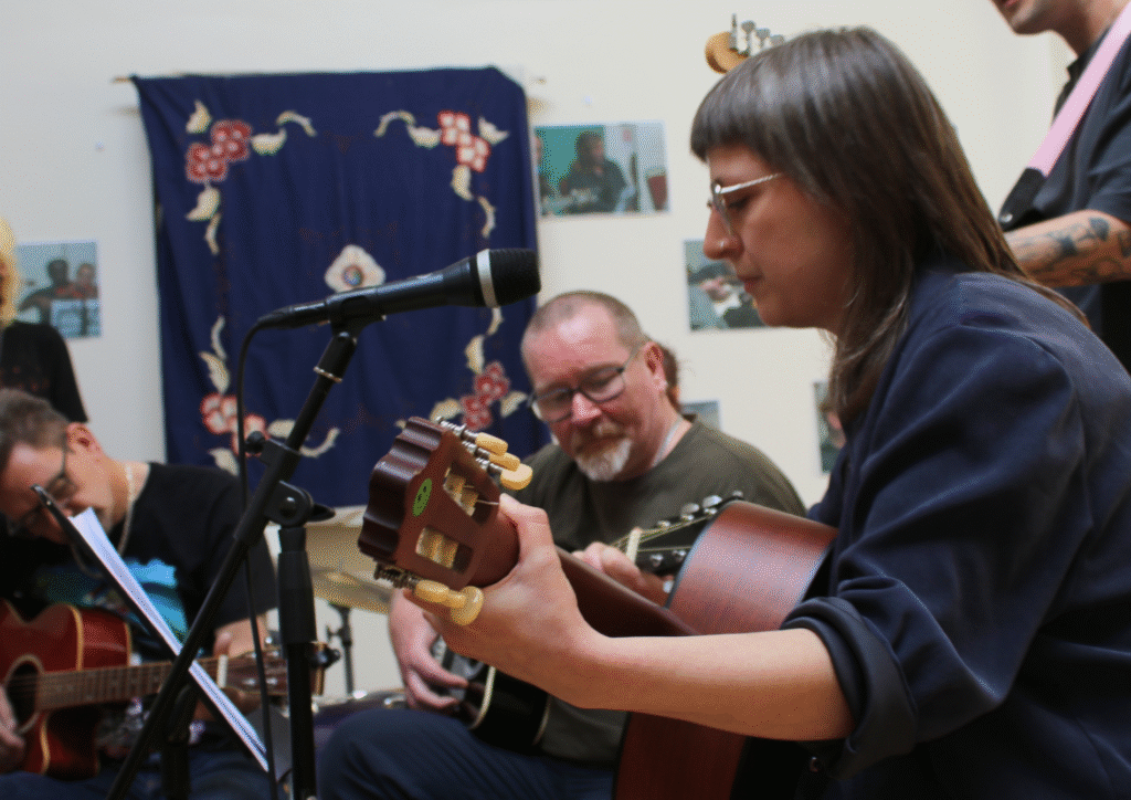 Beginners Music performing in the Unitarian Hall at the spring end of term show