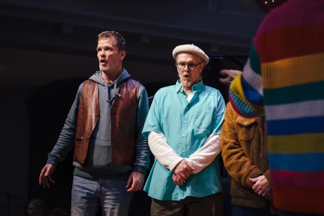 Two singers of the bass section singing as part of the choir's performance at Maggie's memorial held at St George's