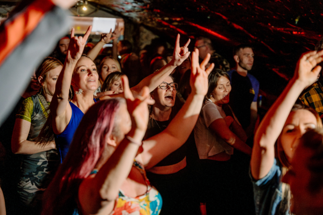 The audience dancing with their arms in the air at Bristol Sober Spaces' sober rave at Basement 45