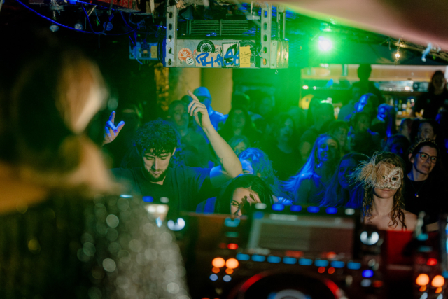 The audience dancing with their hands in the air at our first sober rave at Basement 45