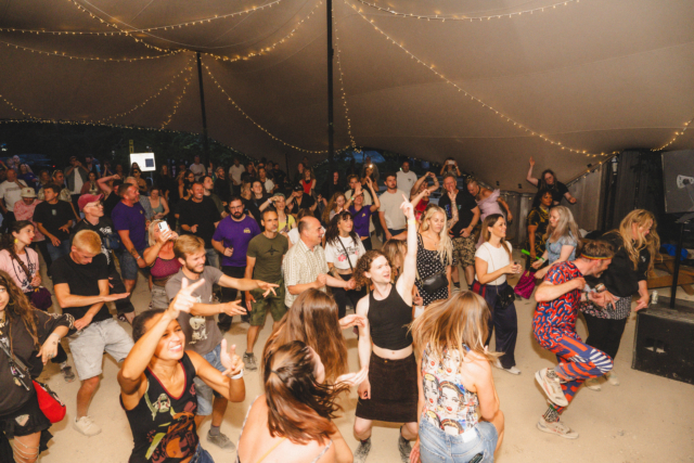 The crowd dancing to Roni Size under the den at Trinity's Sober Spaces day rave