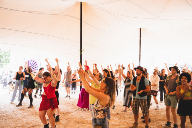 Crowd dancing to Roni Size under the Den at our first sober day rave at Trinity