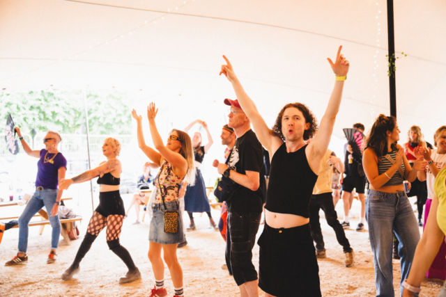 The crowd cheering and dancing at our Sober Day Rave at Trinity