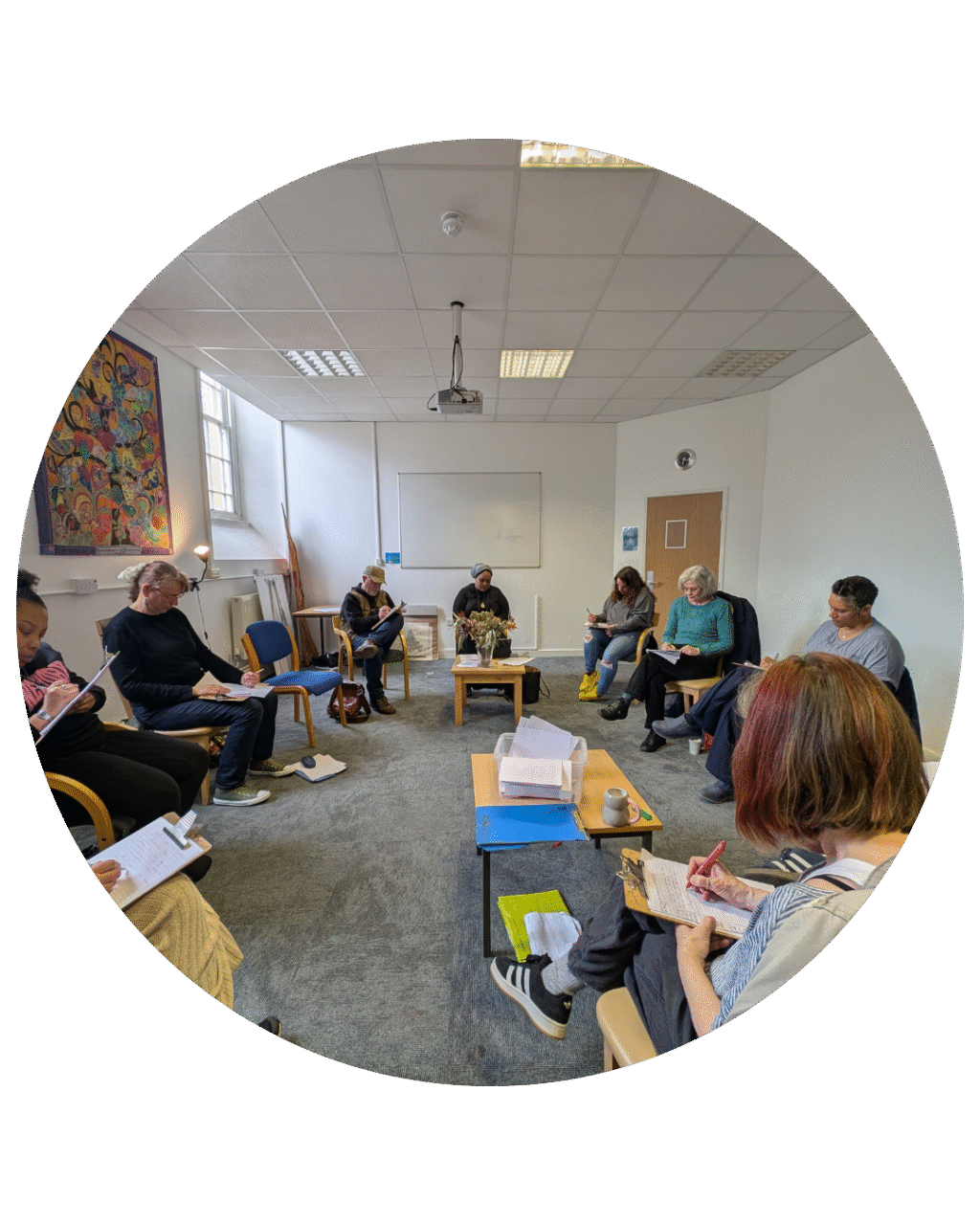 The Creative Writing group sat in a circle writing